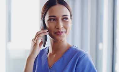 female-nurse-on-mobile-phone